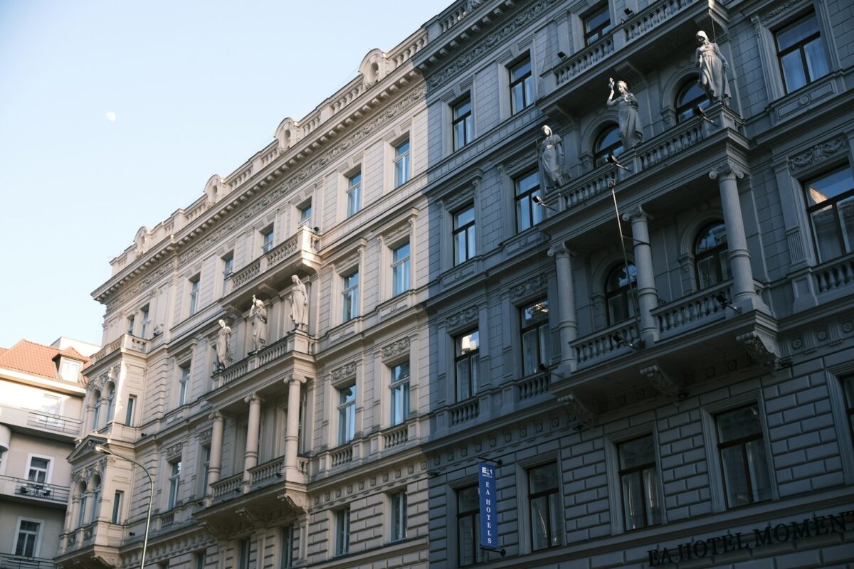 Historic buildings with detailed architecture in daylight.