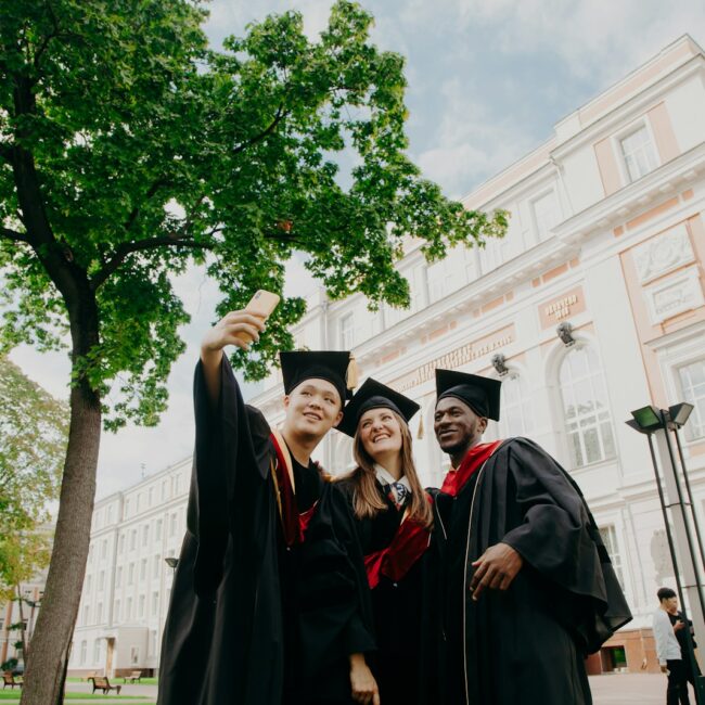 Students with hats at university